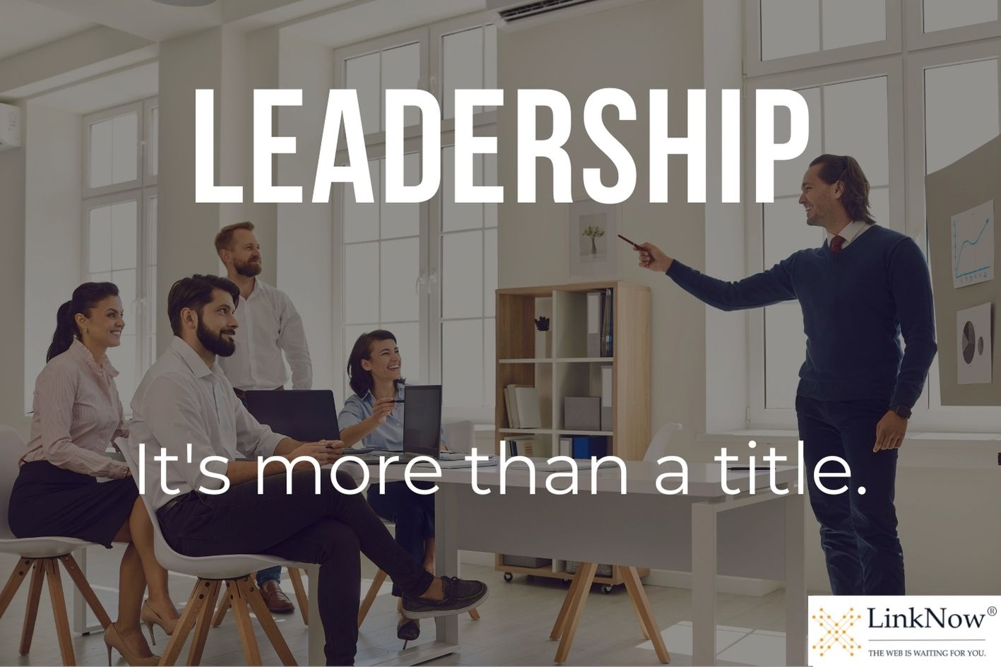 A man leads a discussion in an office. Title card says: "Leadership: It's more than a title."